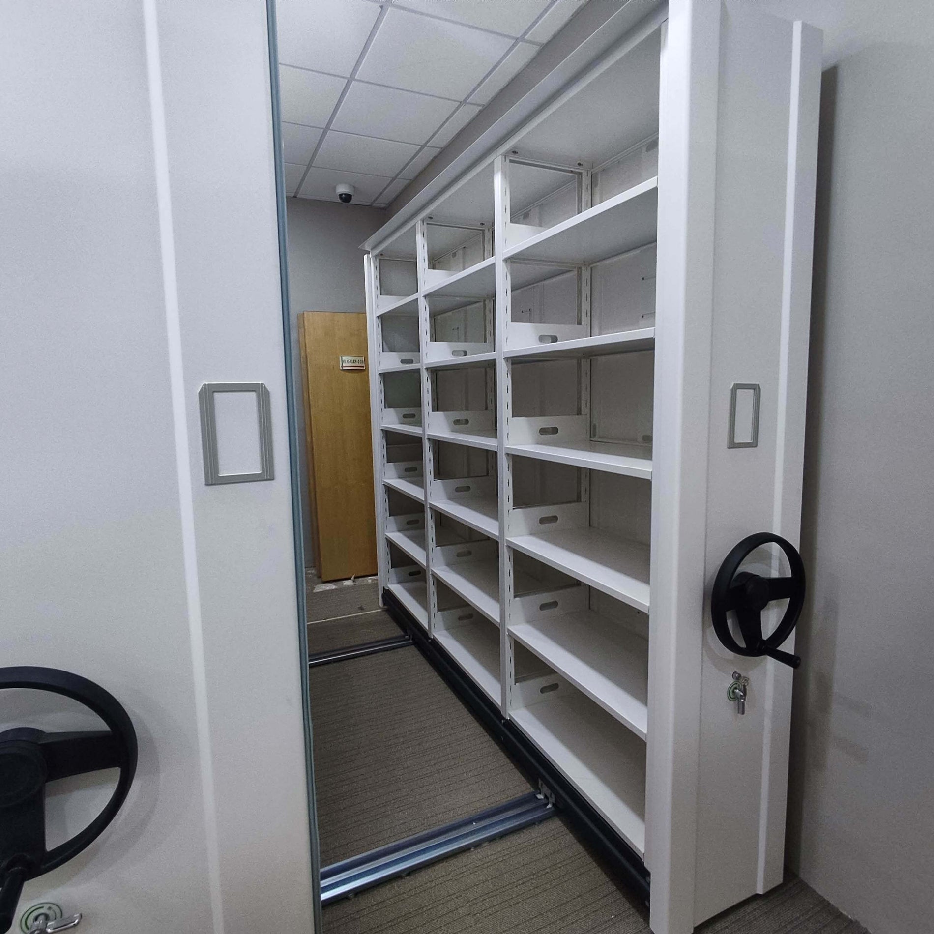 steel shelf rack system with steering wheels for maximizing storage space