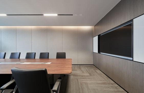 Modern conference room setup featuring sleek chairs and a wooden table, showcasing quality products from an office furniture store in the Philippines.