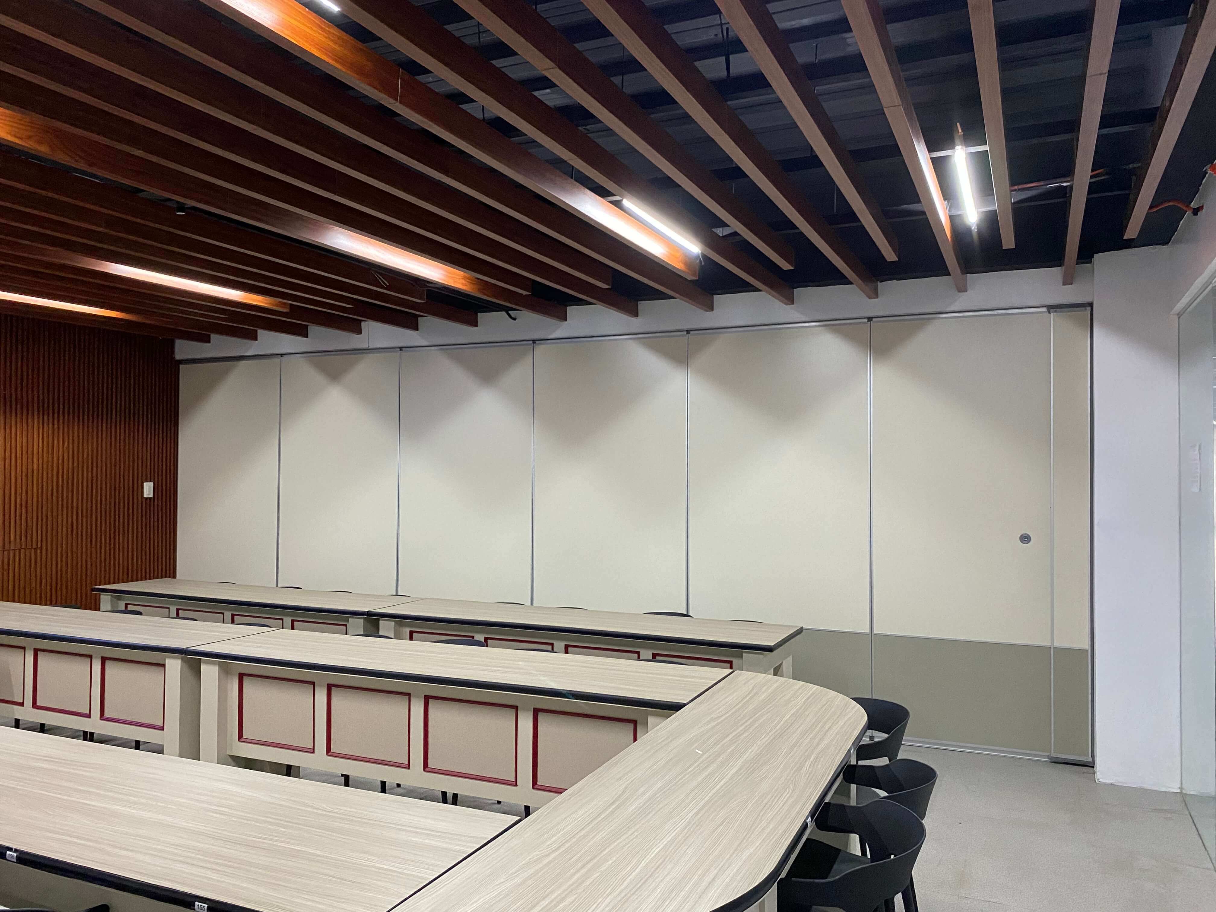 A folding wall divider instantly dividing the rooms with ease in a university in Manila, Philippines